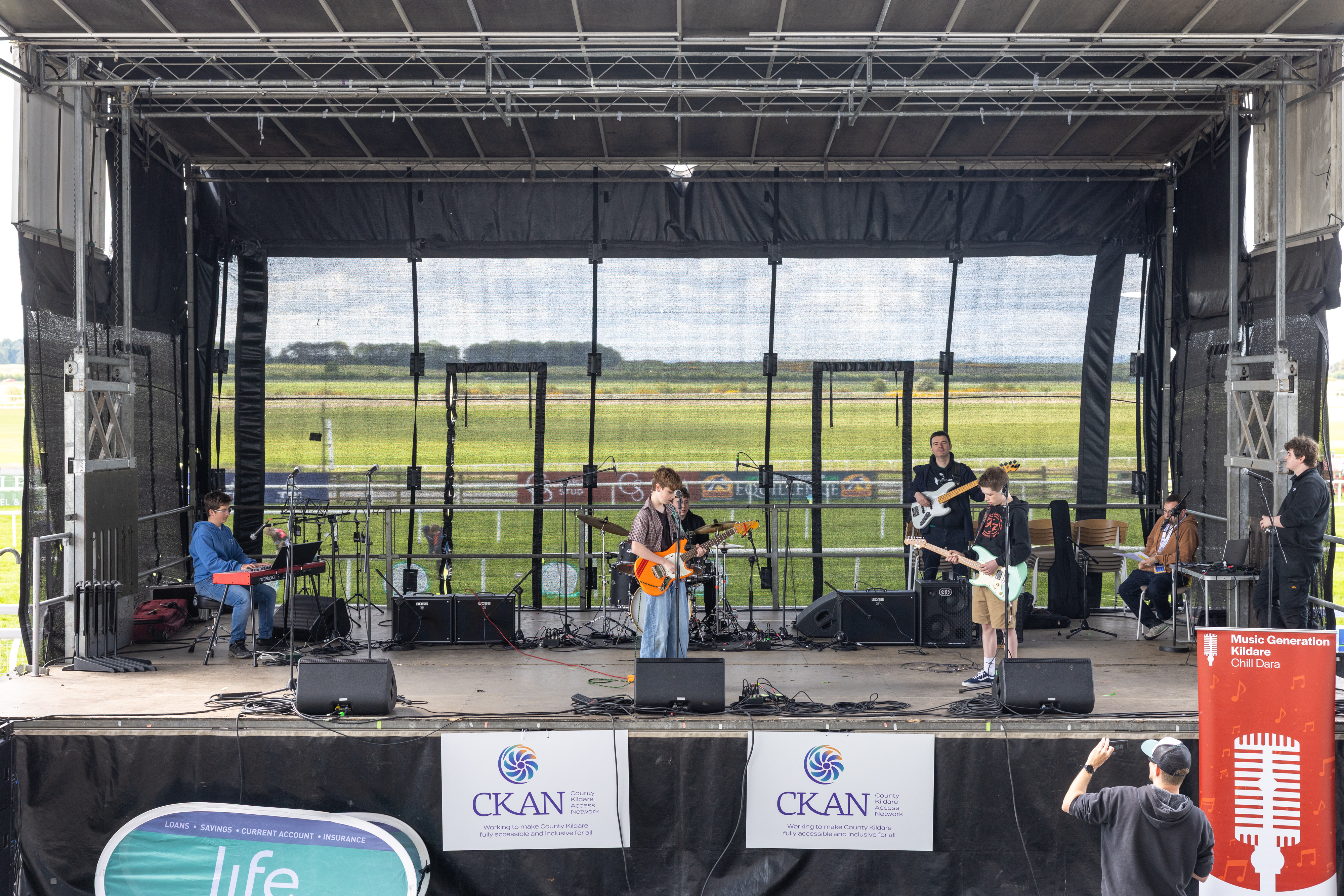 Band preforming on stage.
